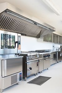Symbolic picture of a professional kitchen with various appliances